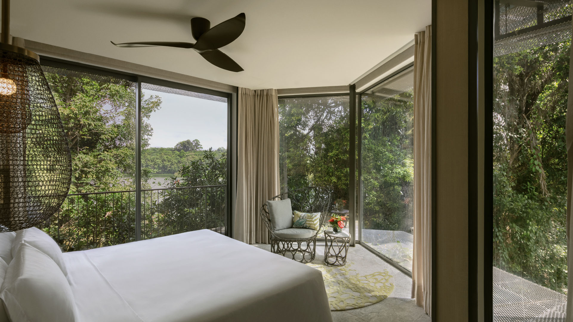 Awaken to the beauty of nature in our Rainforest Suite, featuring a luxurious king-size bed and a separate living room that offers stunning garden views. This serene setting invites relaxation and tranquility, providing the perfect retreat for your getaway.